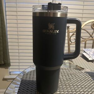 Stanley Midnight Blue Travel Mug with Handle.  Only used a couple times.